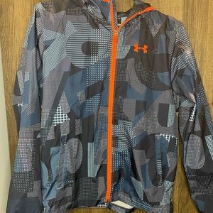 Youth large, Boys large, Blue and orange wind breaker.